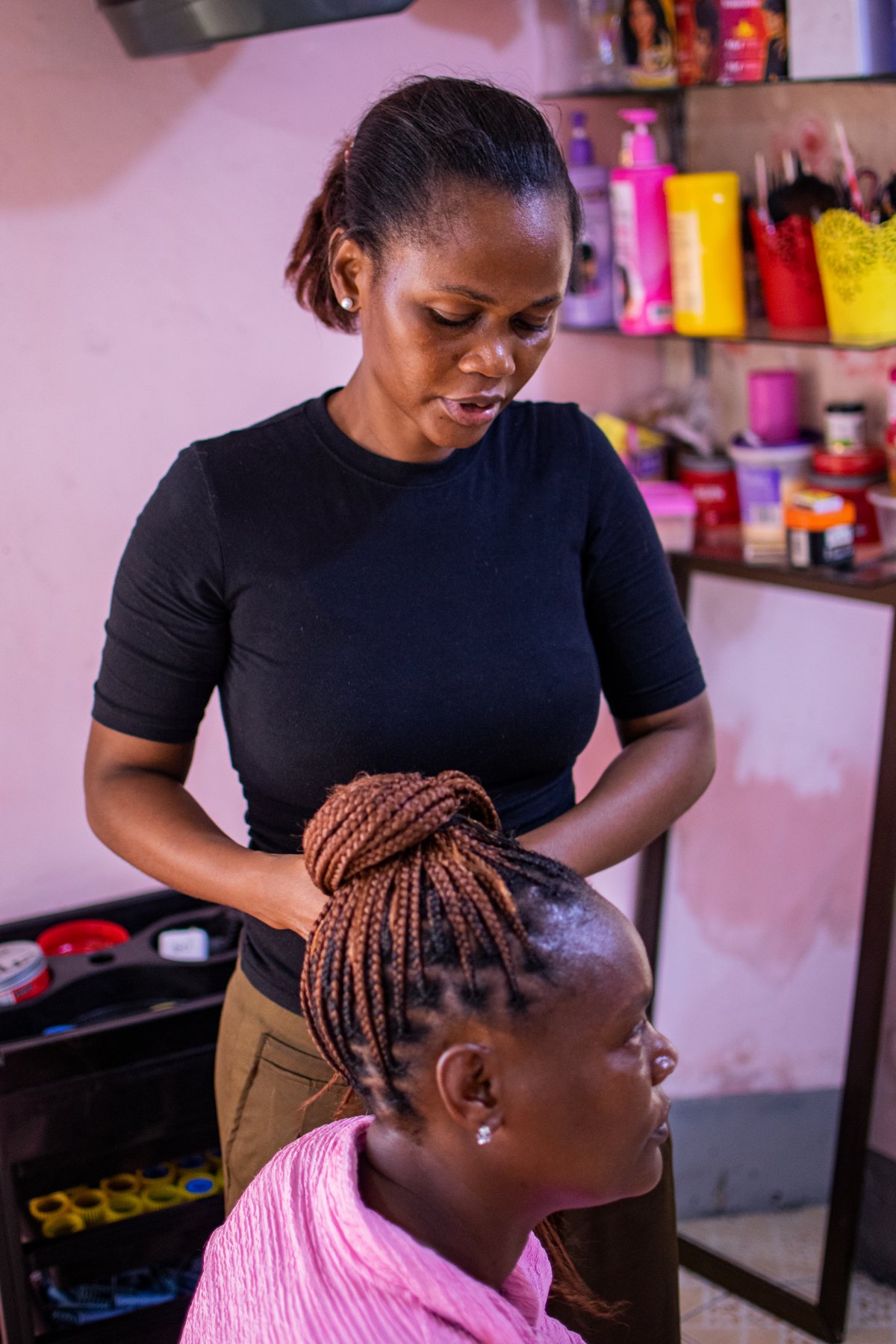 Hairdresser at work with a client in a real appointment setting
