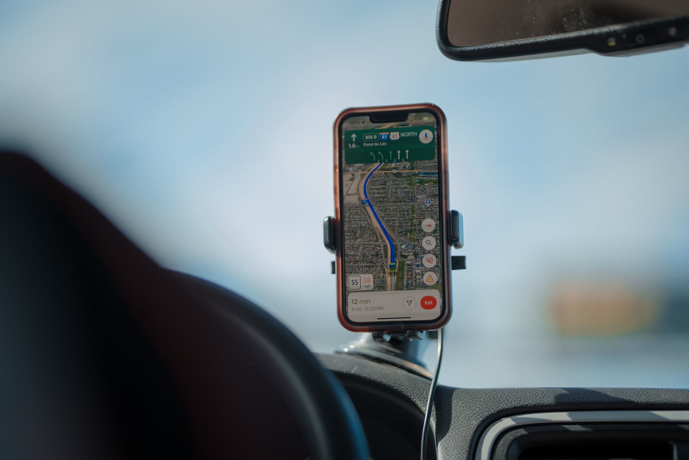 Navigation route displayed on a phone mounted inside a vehicle