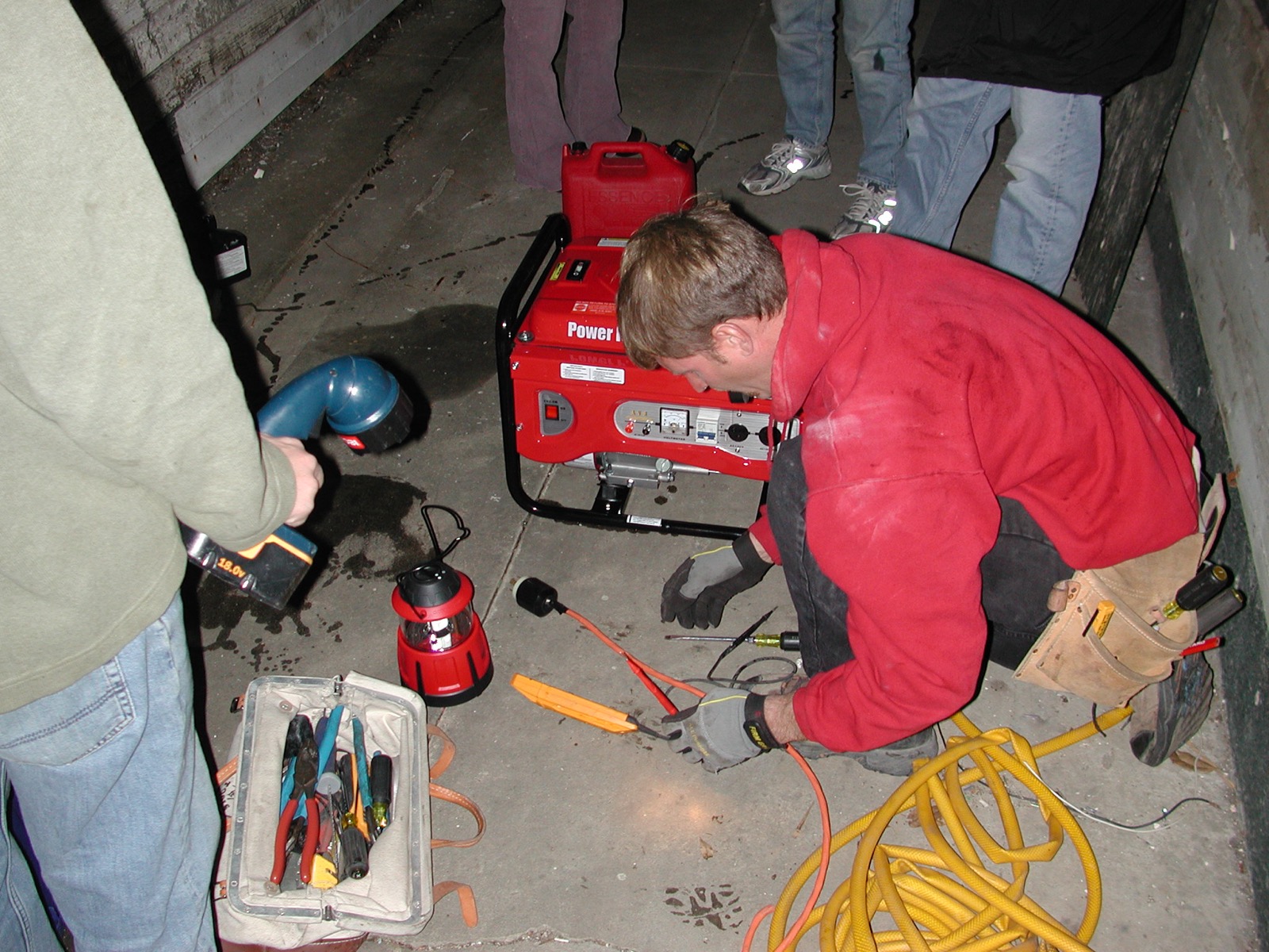 Electrician working at a home electrical panel before a job is confirmed
