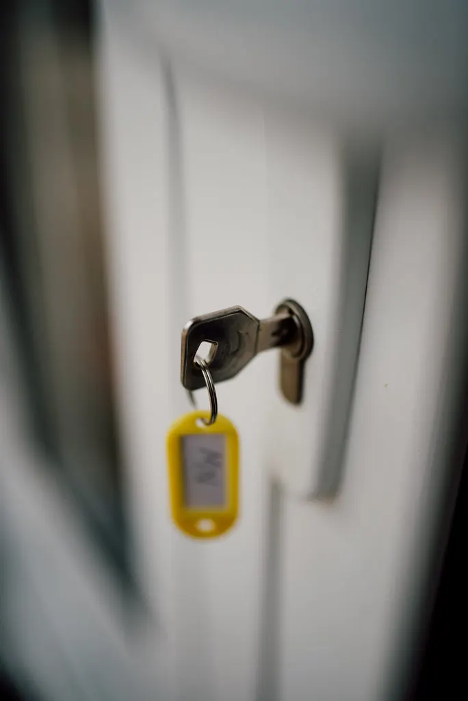 Key in a front door lock before a home visit