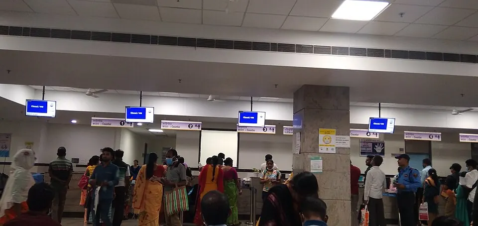 People working through registration and appointment admin at a real clinic desk