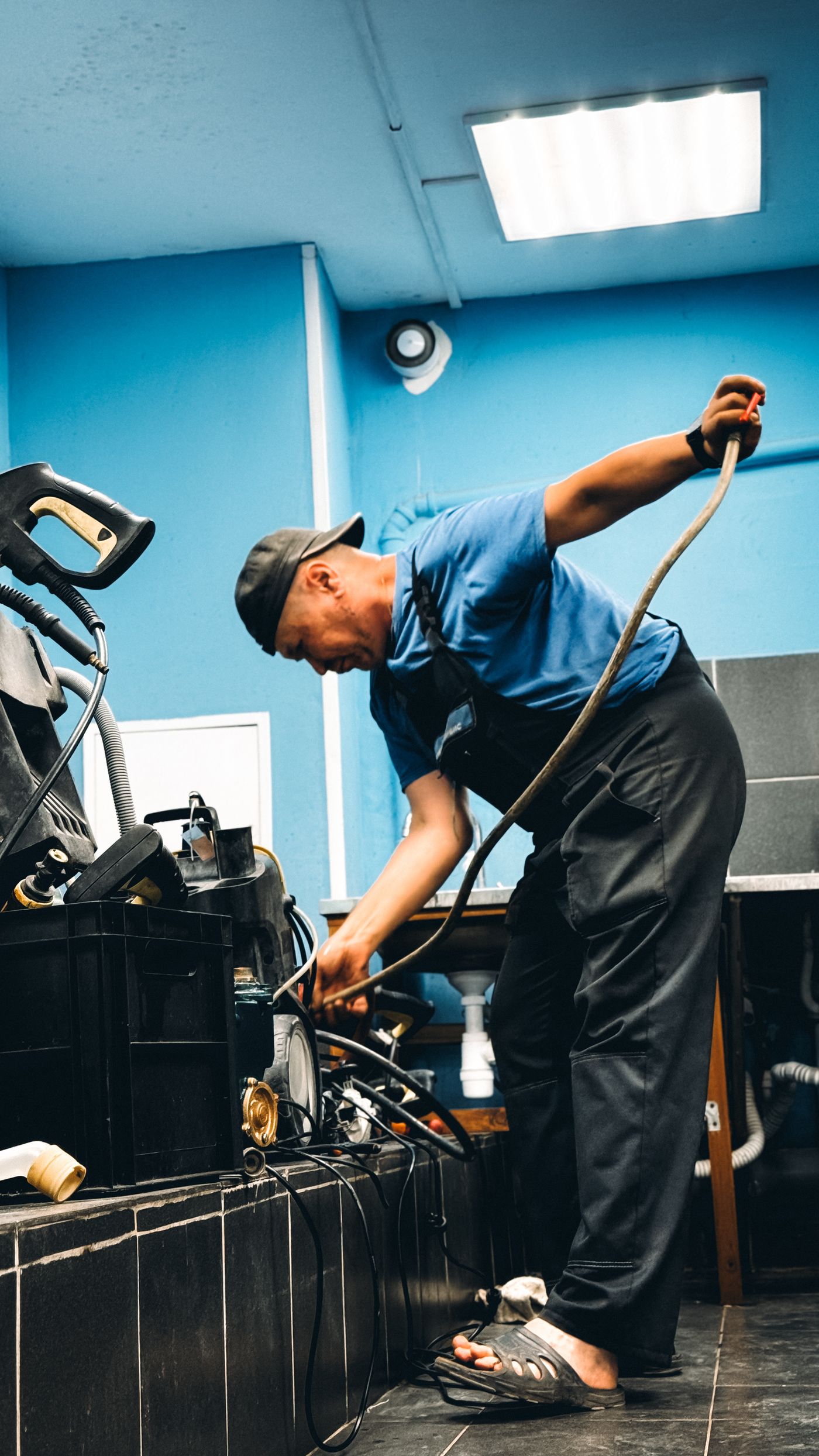 Technician repairing equipment in a workshop