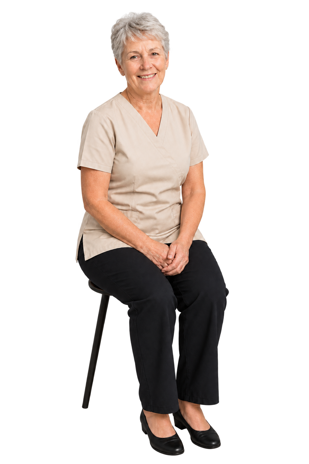 Smiling ear wax removal specialist in black scrubs